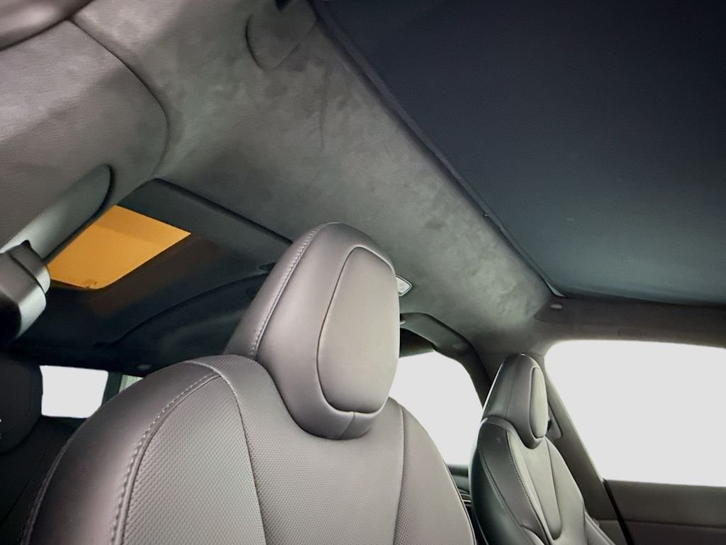 Used 2023 Solid Black Tesla  image 18