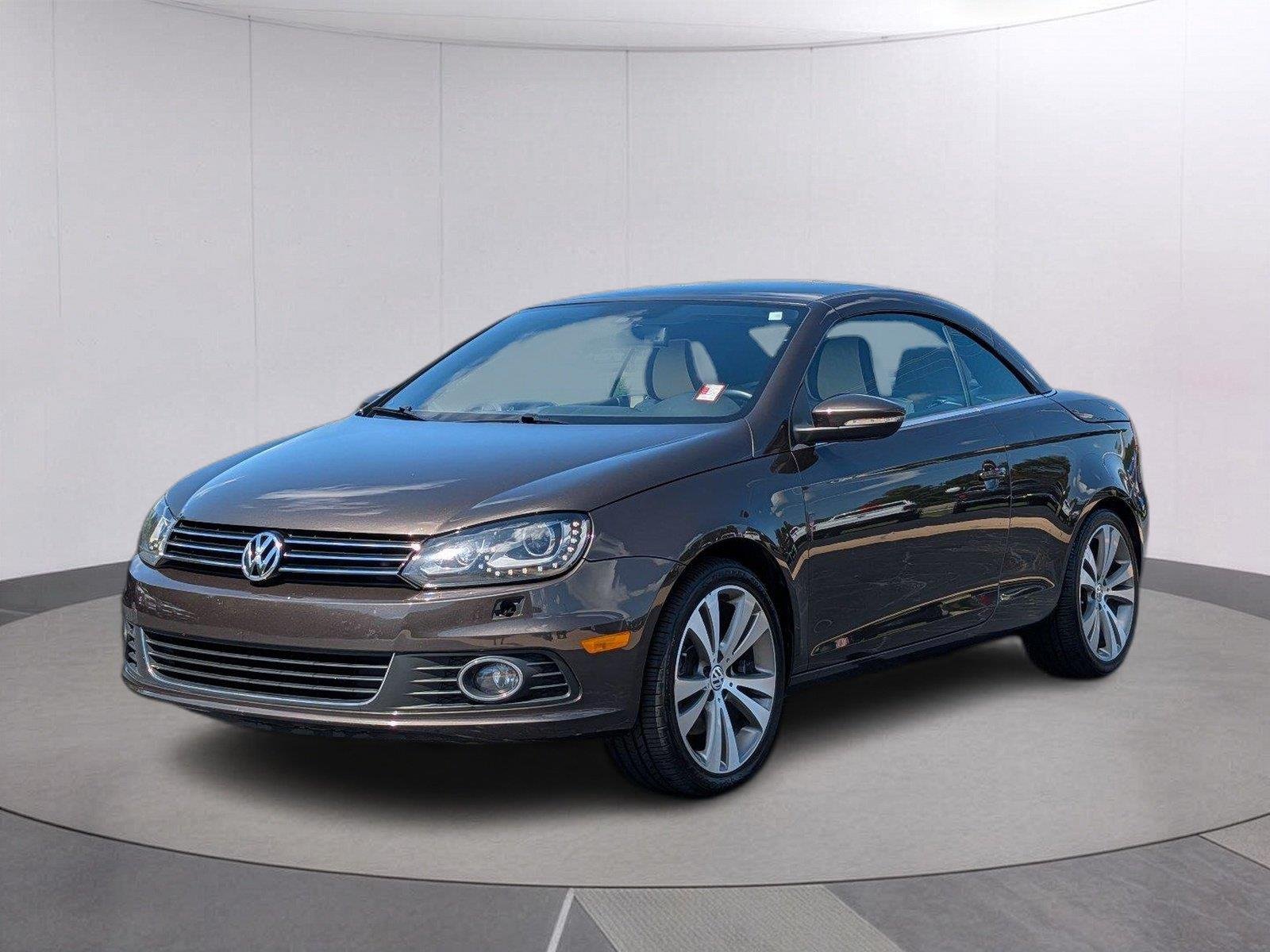 Used 2013 Black Oak Brown Metallic Volkswagen Lux image 1