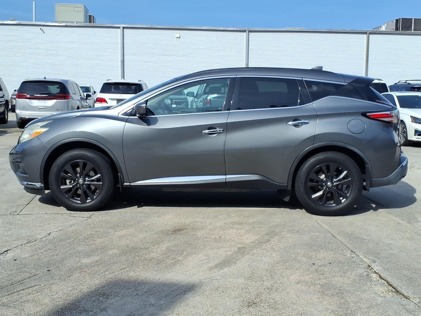 Used 2017 Gun Metallic Nissan SV image 3