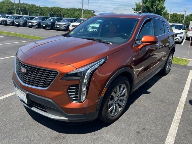 Used 2019 Brown Cadillac Premium Luxury image 1