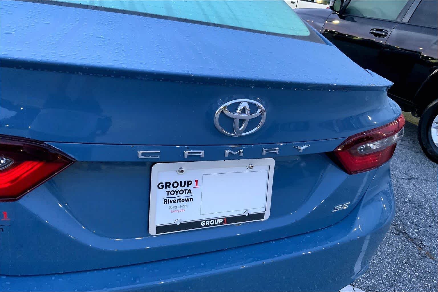 Used 2024 Cavalry Blue Toyota SE image 30
