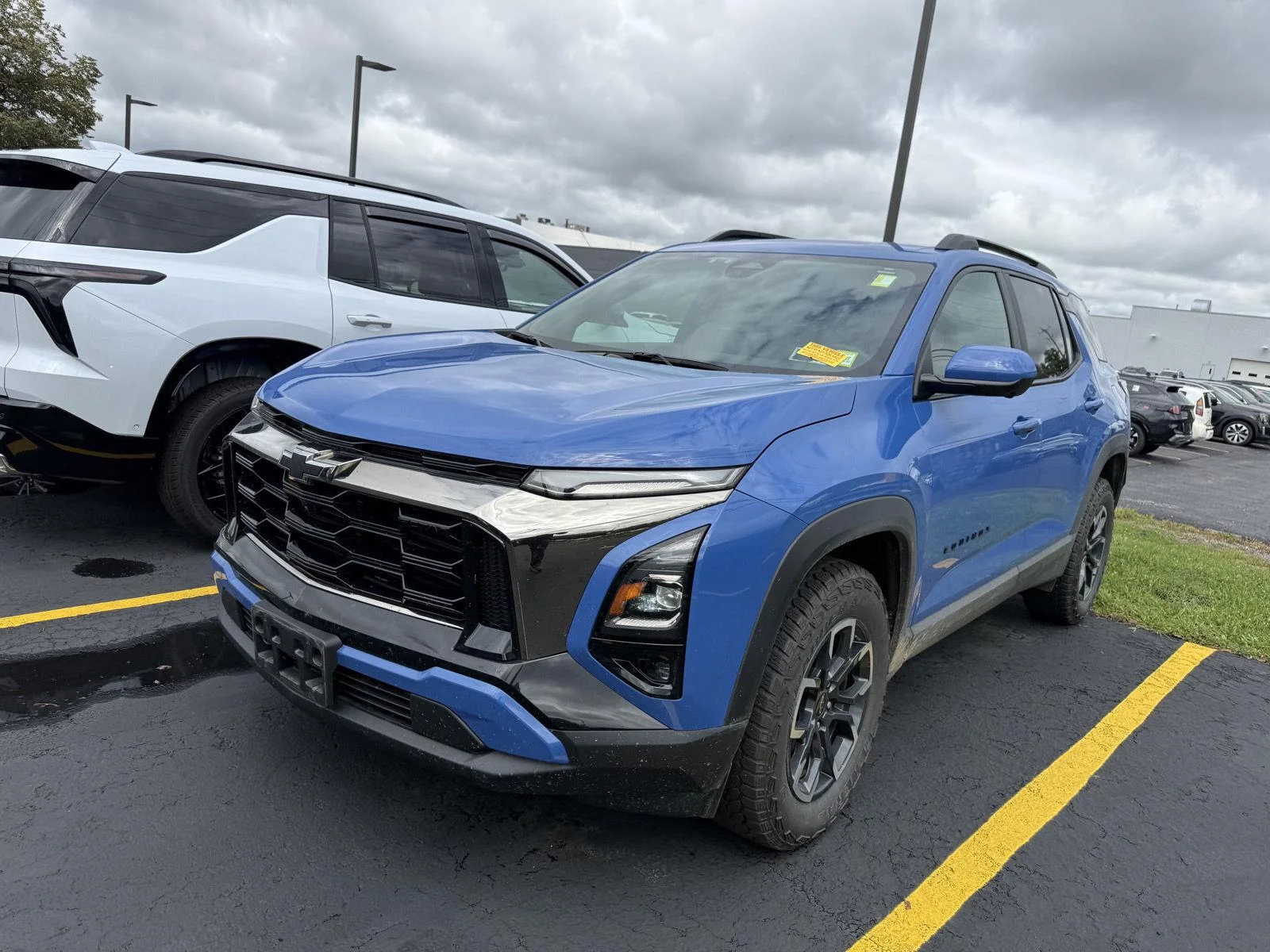 Used 2025 Reef Blue Metallic Chevrolet AWD ACTIV image 3