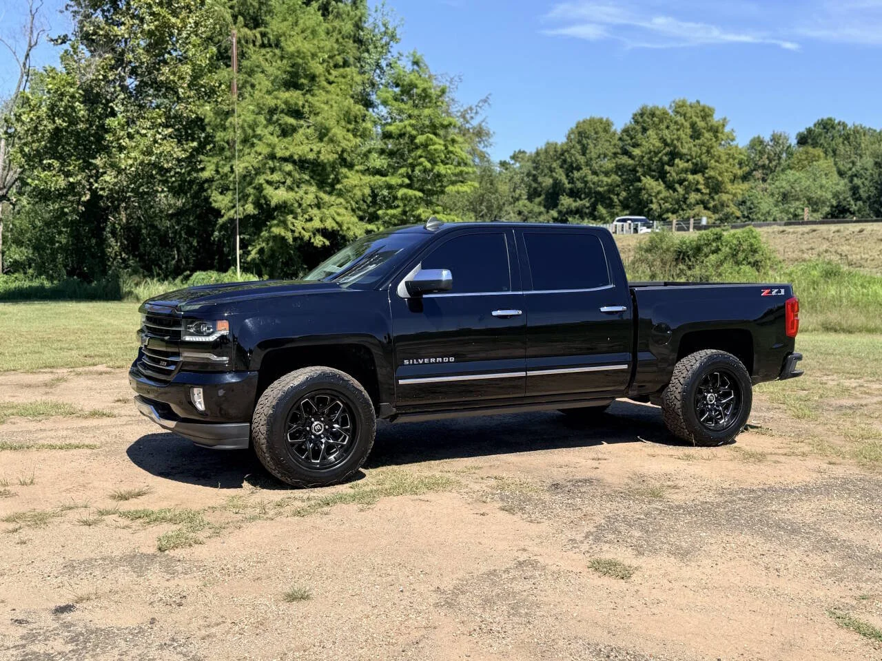 Used 2018 Black Chevrolet LTZ Z71 4x4 4dr Crew Cab 5.8 ft. SB image 1