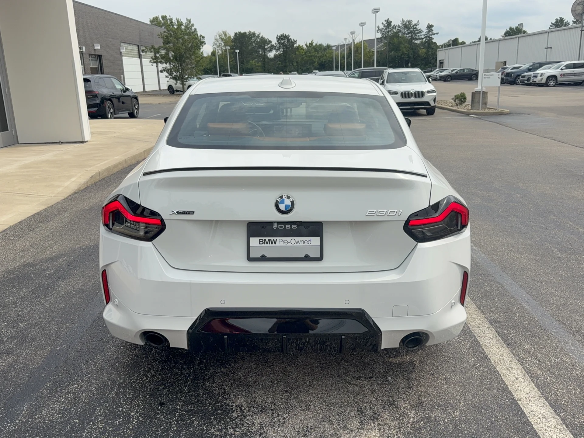 Used 2025 Alpine White BMW 230i xDrive image 4