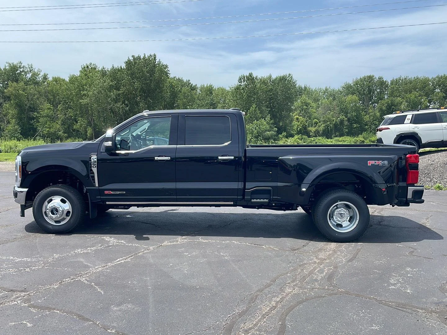 New 2026 Agate Black Metallic Ford LARIAT image 2
