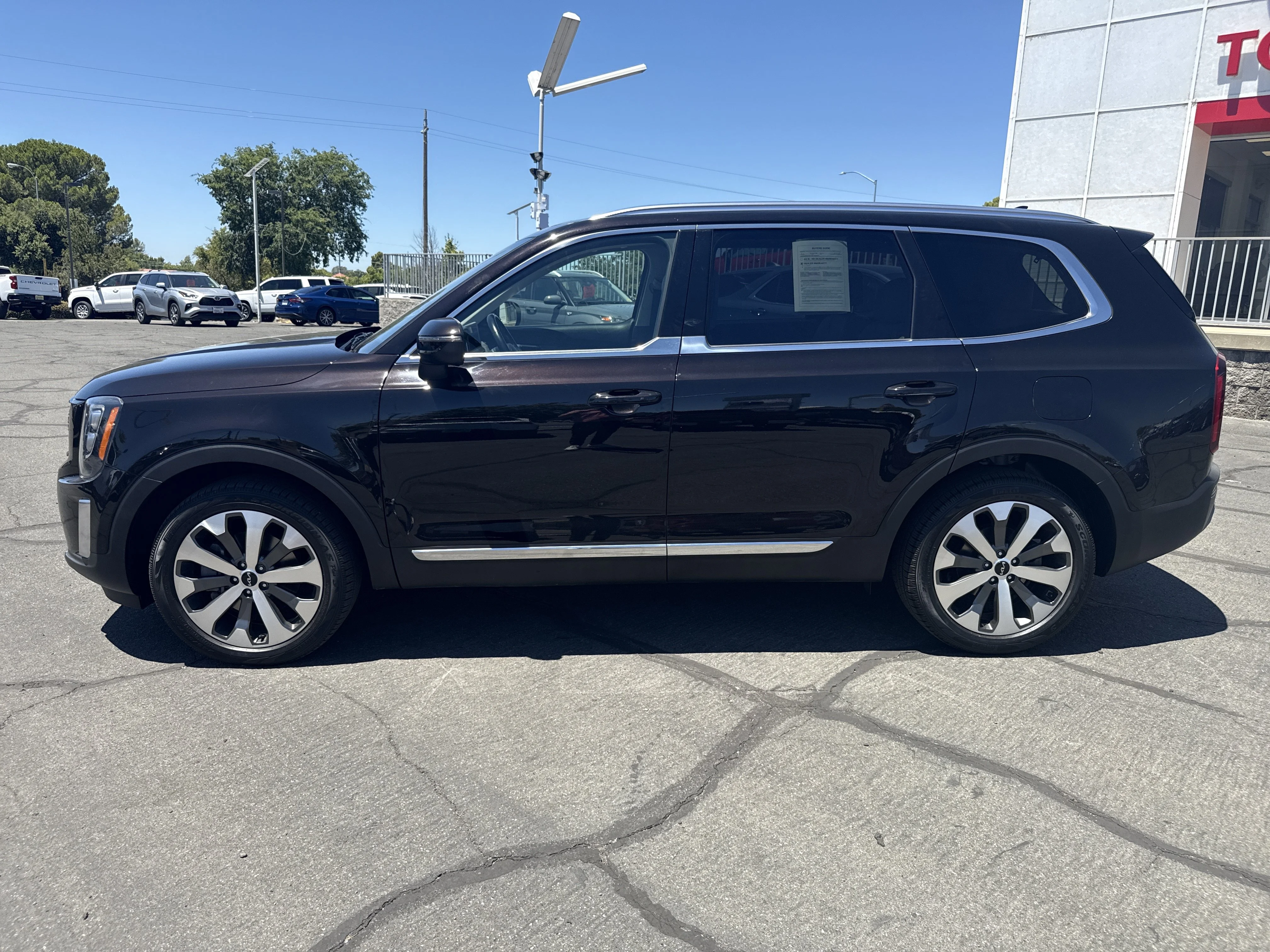 Used 2022 Black Copper Kia EX image 4