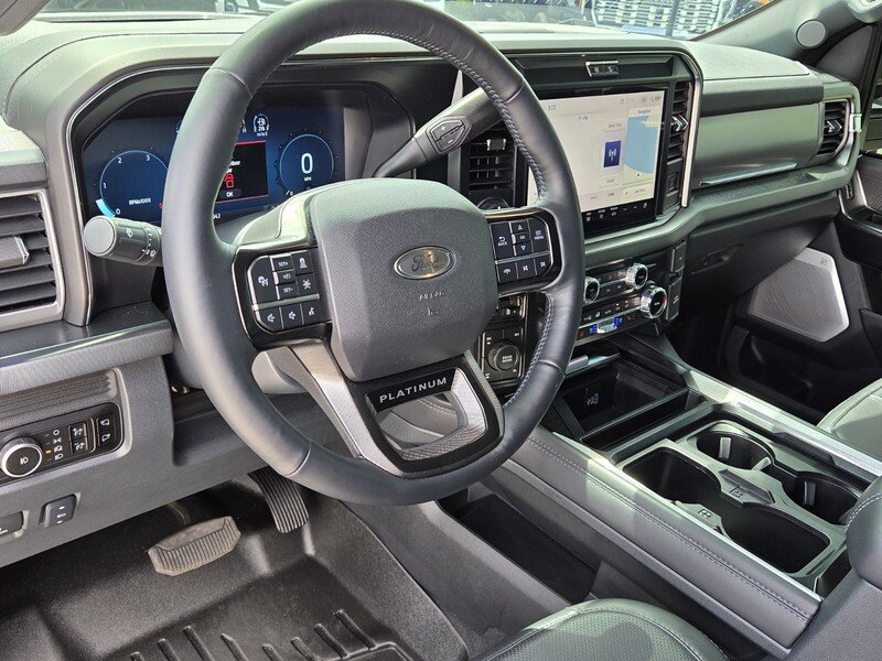 Used 2025 Blue Metallic FORD PLATINUM 4WD CREW CAB 6.75