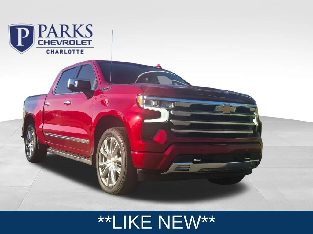 Used 2025 Radiant Red Tintcoat Chevrolet High Country image 1