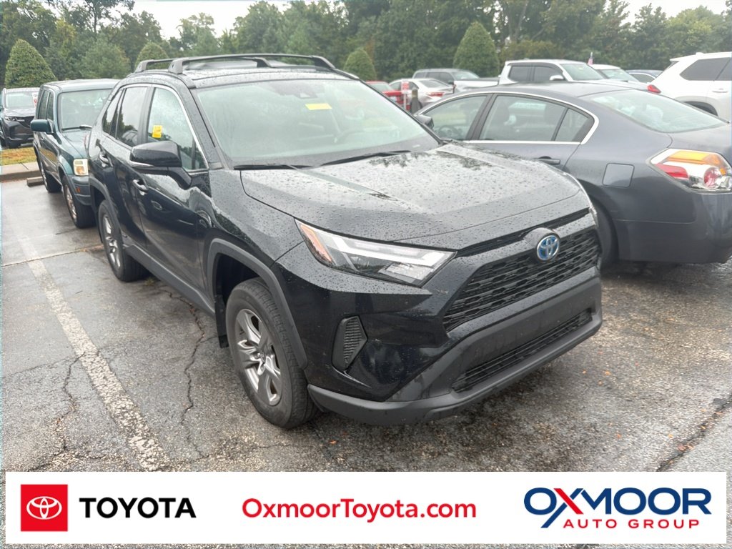 Used 2024 Midnight Black Metallic Toyota Hybrid XLE image 1