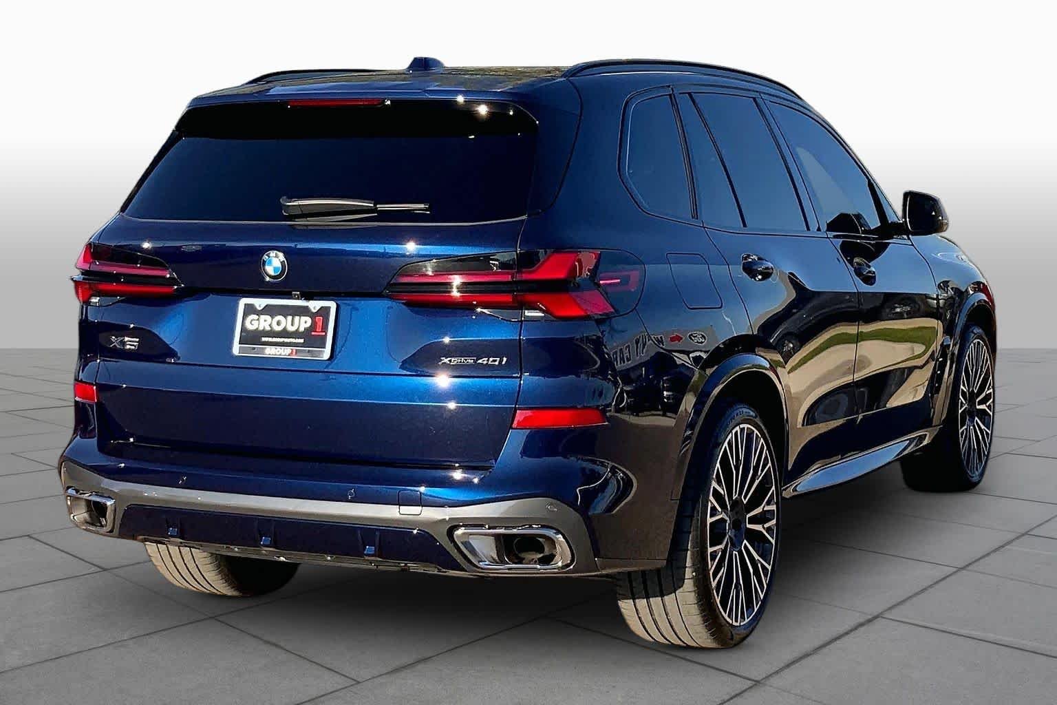 Certified Used 2025 Tanzanite Blue II Metallic BMW xDrive40i image 13