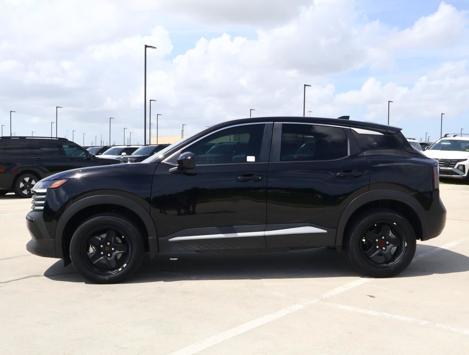 Used 2025 Super Black Nissan SV image 2