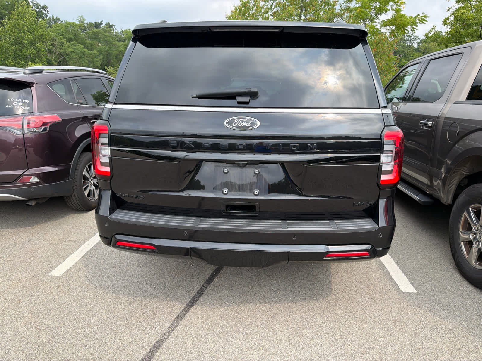 Used 2022 Agate Black Metallic Ford Limited image 8