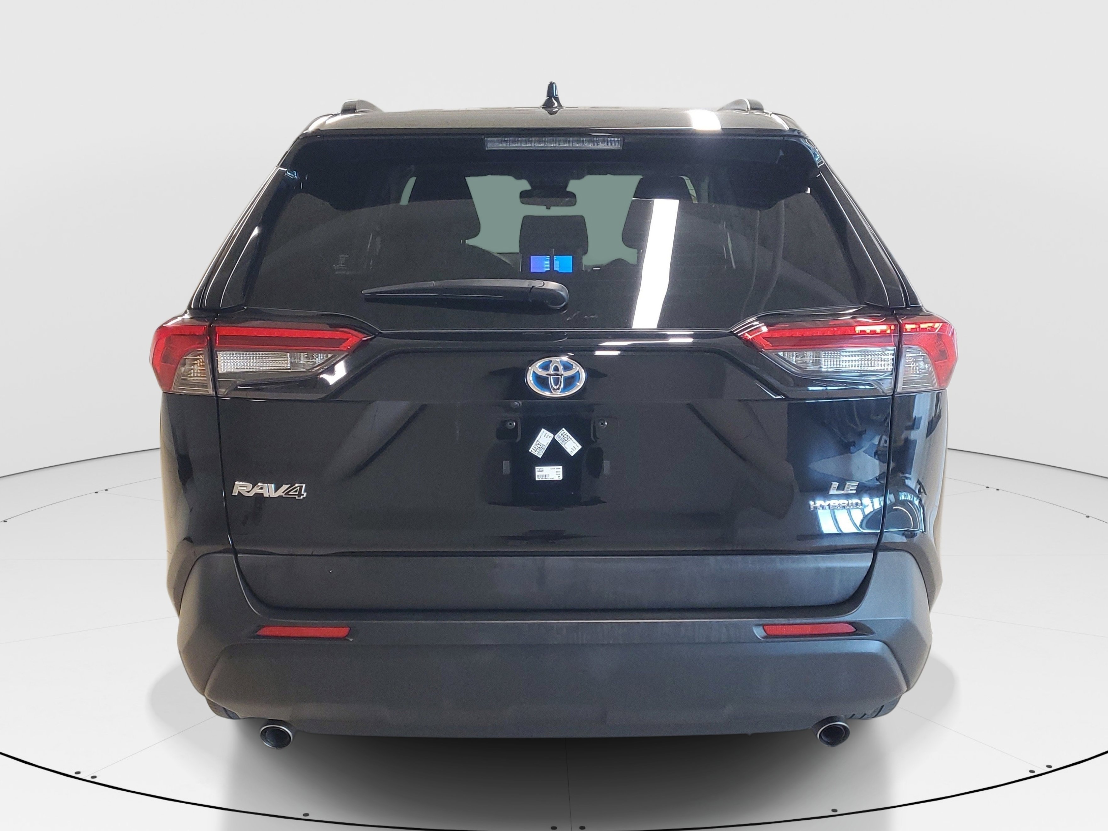 Used 2024 Midnight Black Metallic Toyota Hybrid LE image 6