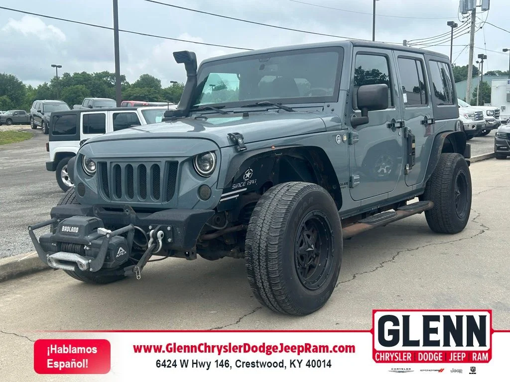 Used 2014 Gray Jeep Unlimited Sport image 1