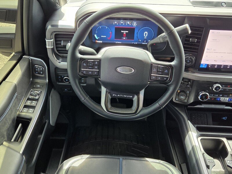 Used 2025 Blue Metallic FORD PLATINUM 4WD CREW CAB 6.75
