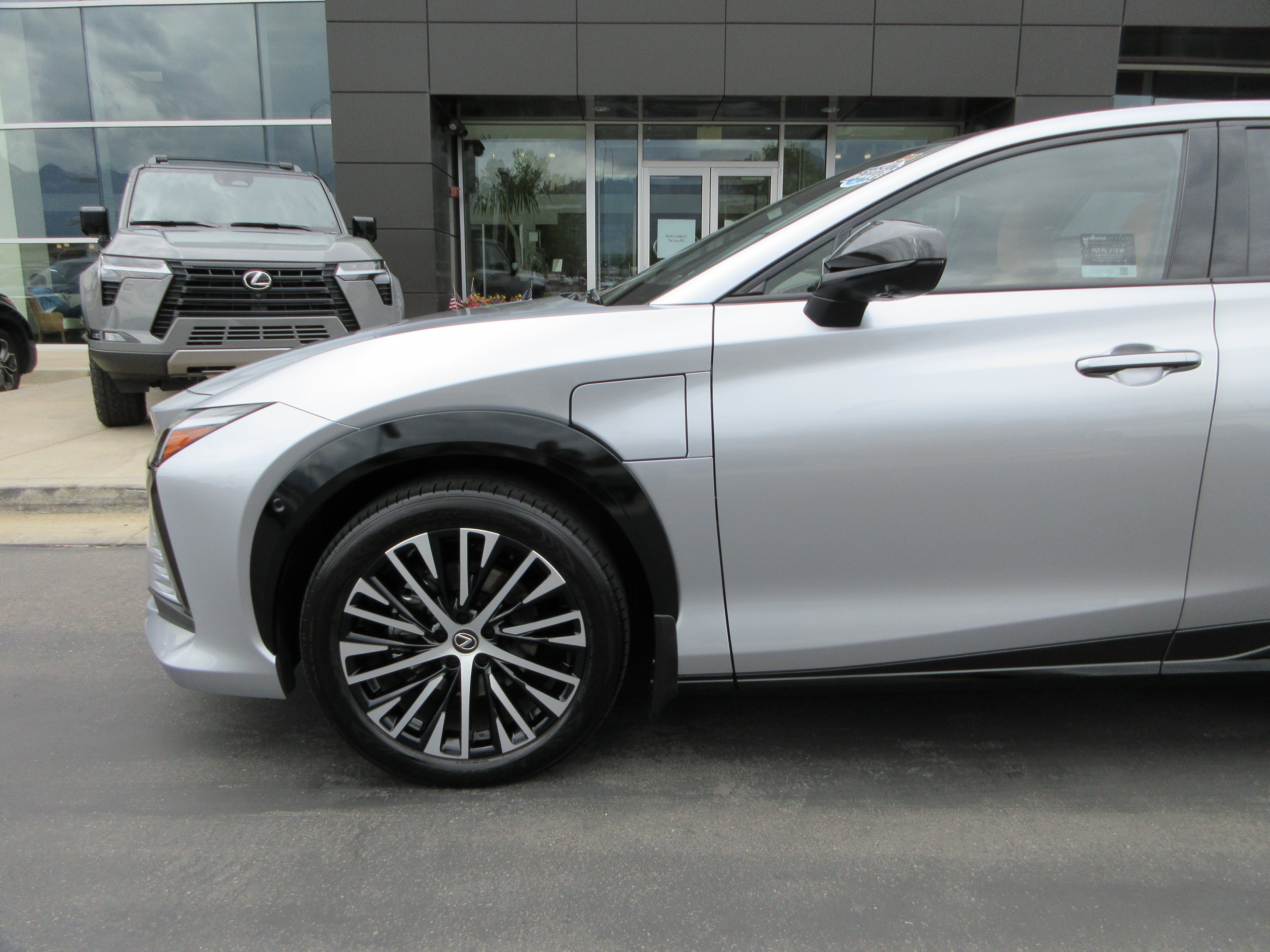 Used 2023 Lexus RZ Luxury with VIN JTJAAAAB0PA007801 for sale in Murray, UT