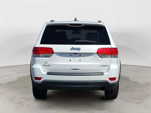 Used 2018 Bright White Jeep Laredo E image 4