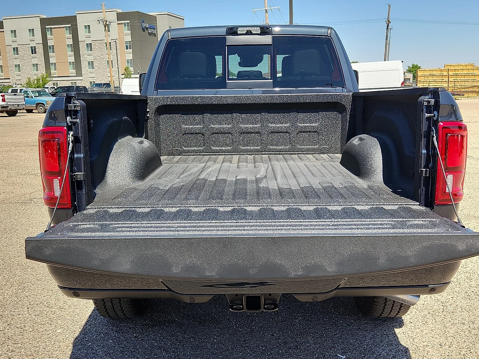 New 2026 Forged Blue Ram LARAMIE CREW CAB 4X4 6