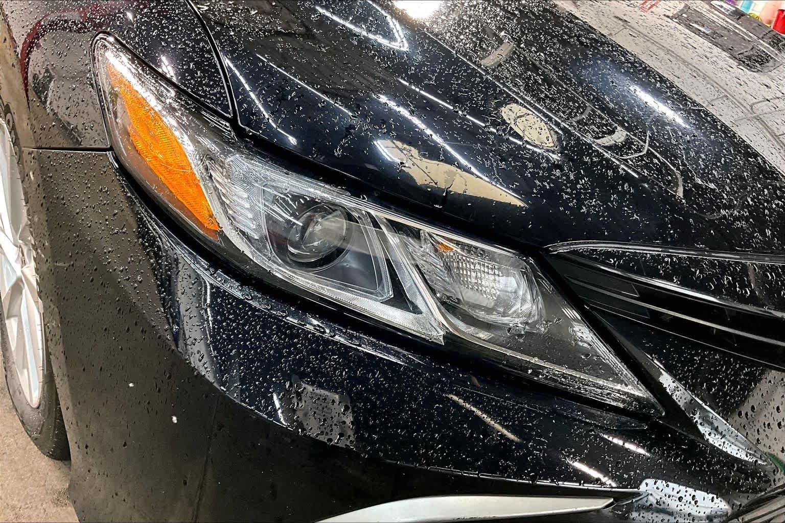 Used 2024 Midnight Black Metallic Toyota LE image 28