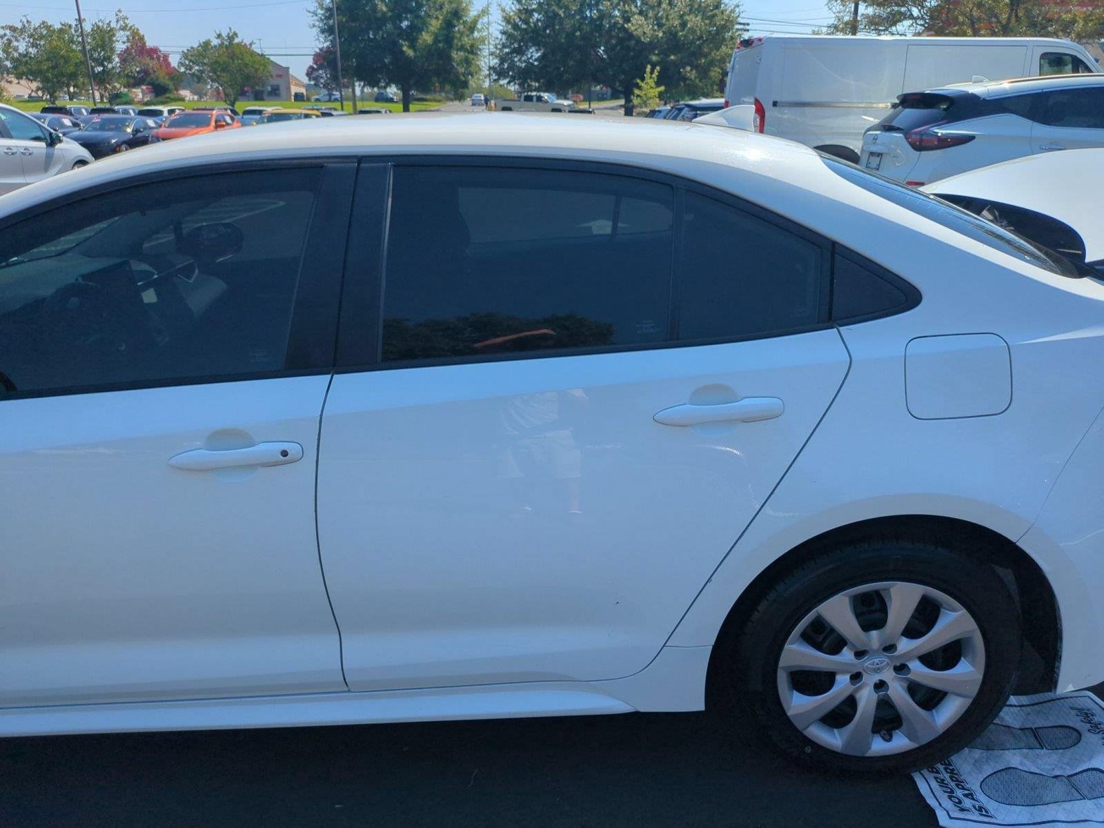 Used 2021 Super White Toyota LE image 28