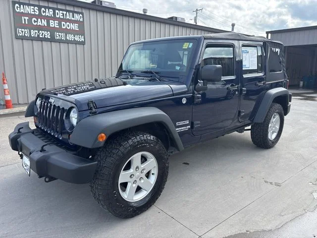 Used 2013 Blue Jeep Unlimited Sport image 3