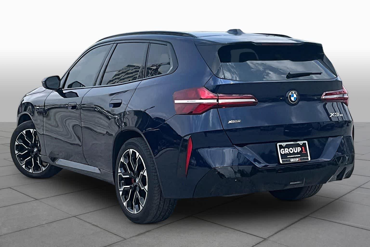 Used 2026 Tanzanite Blue II Metallic BMW 30 xDrive image 11