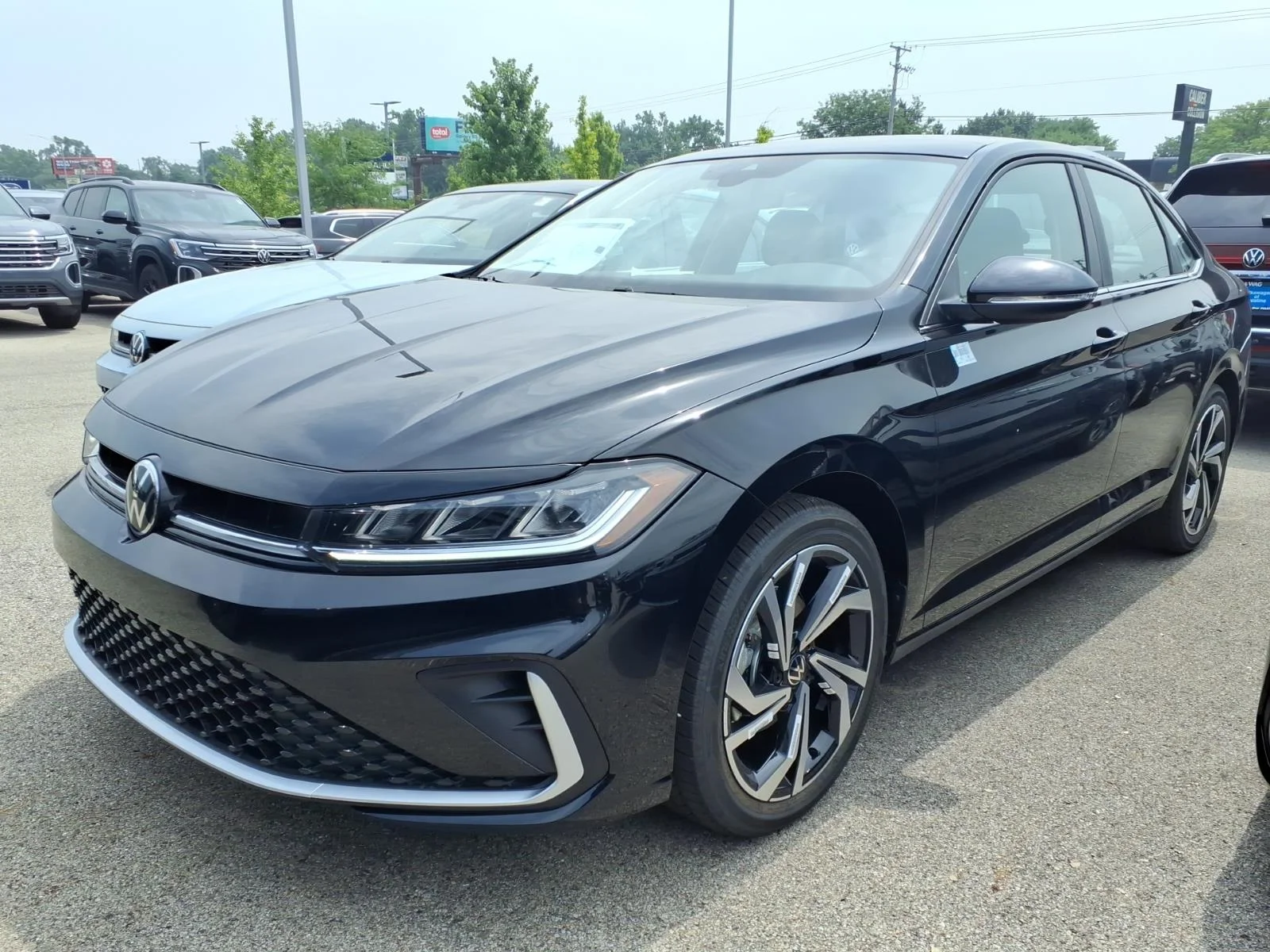 New 2026 Deep Black Pearl Volkswagen SEL AUTO image 2