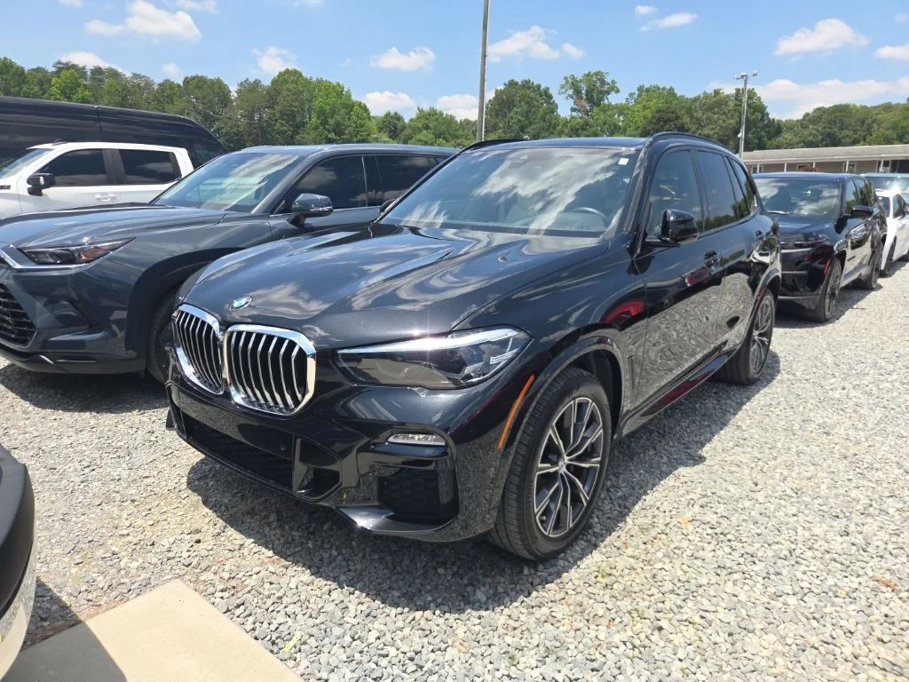 Used 2020 Black BMW sDrive40i image 1