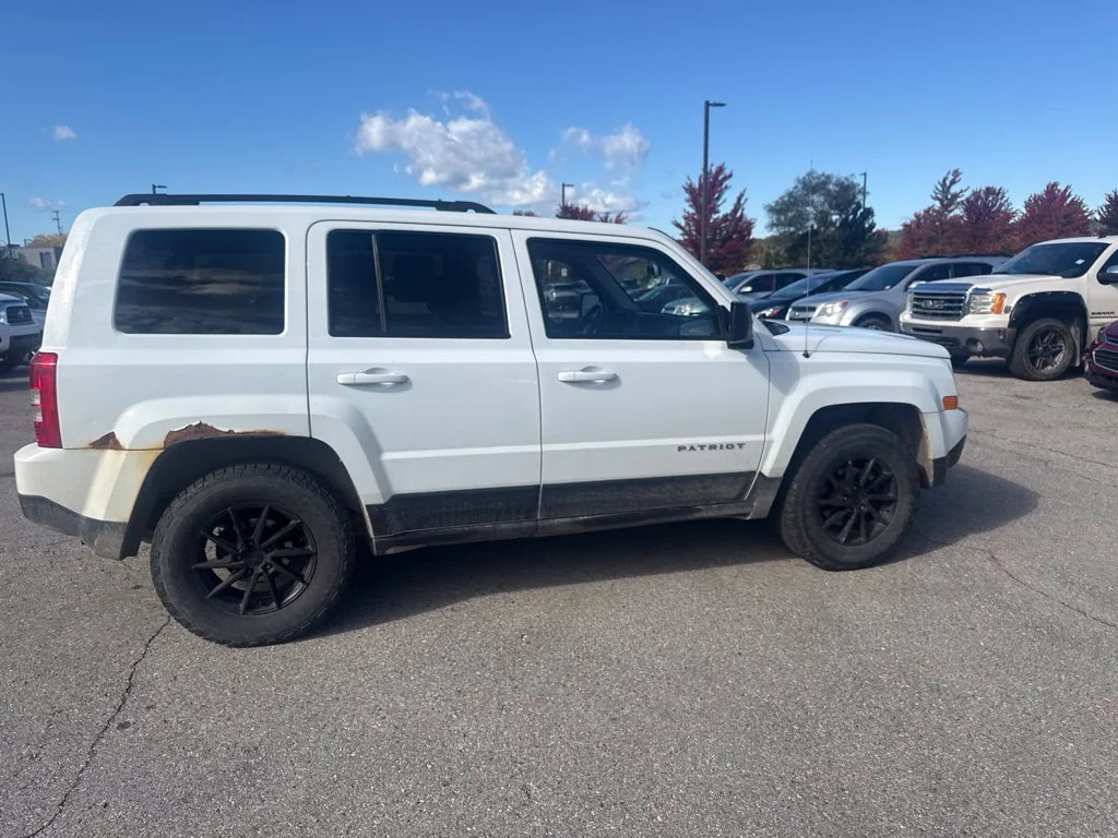 Used 2015 Bright White Clearcoat Jeep Sport image 14