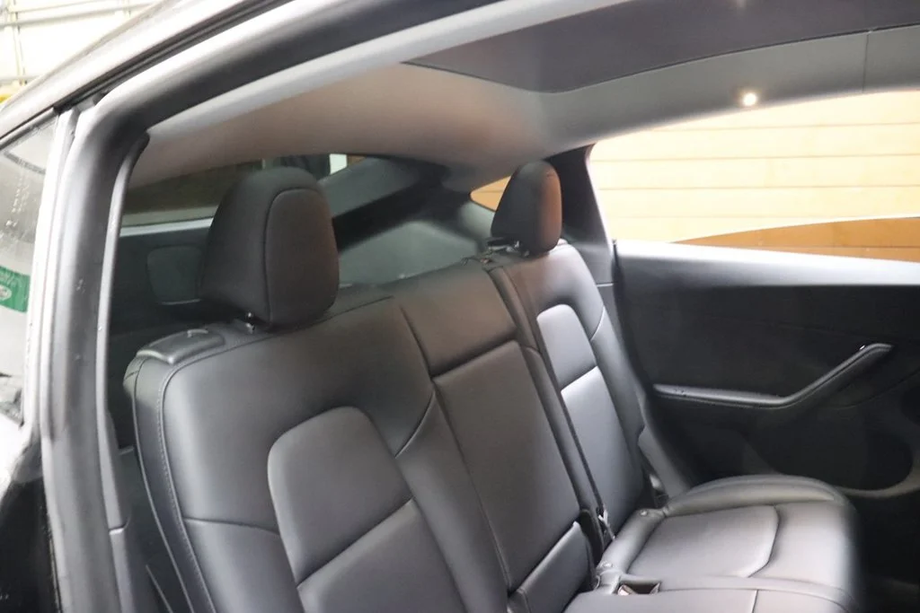 Used 2022 Solid Black Tesla Performance image 60