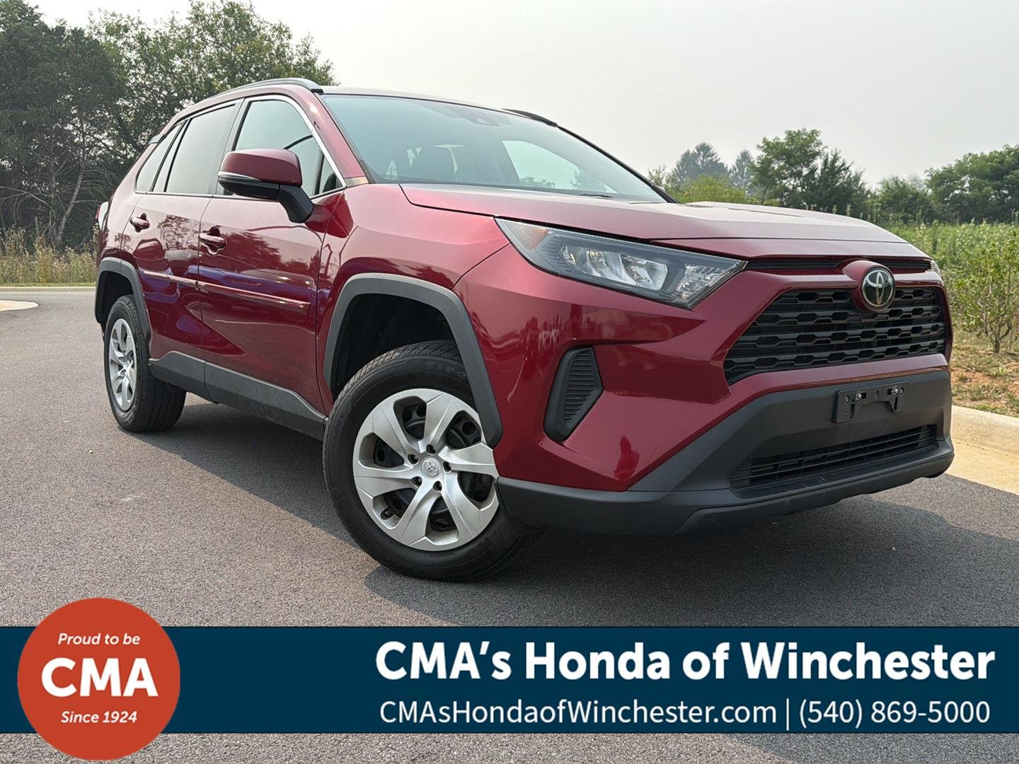 Used 2021 Ruby Flare Pearl Toyota LE image 1