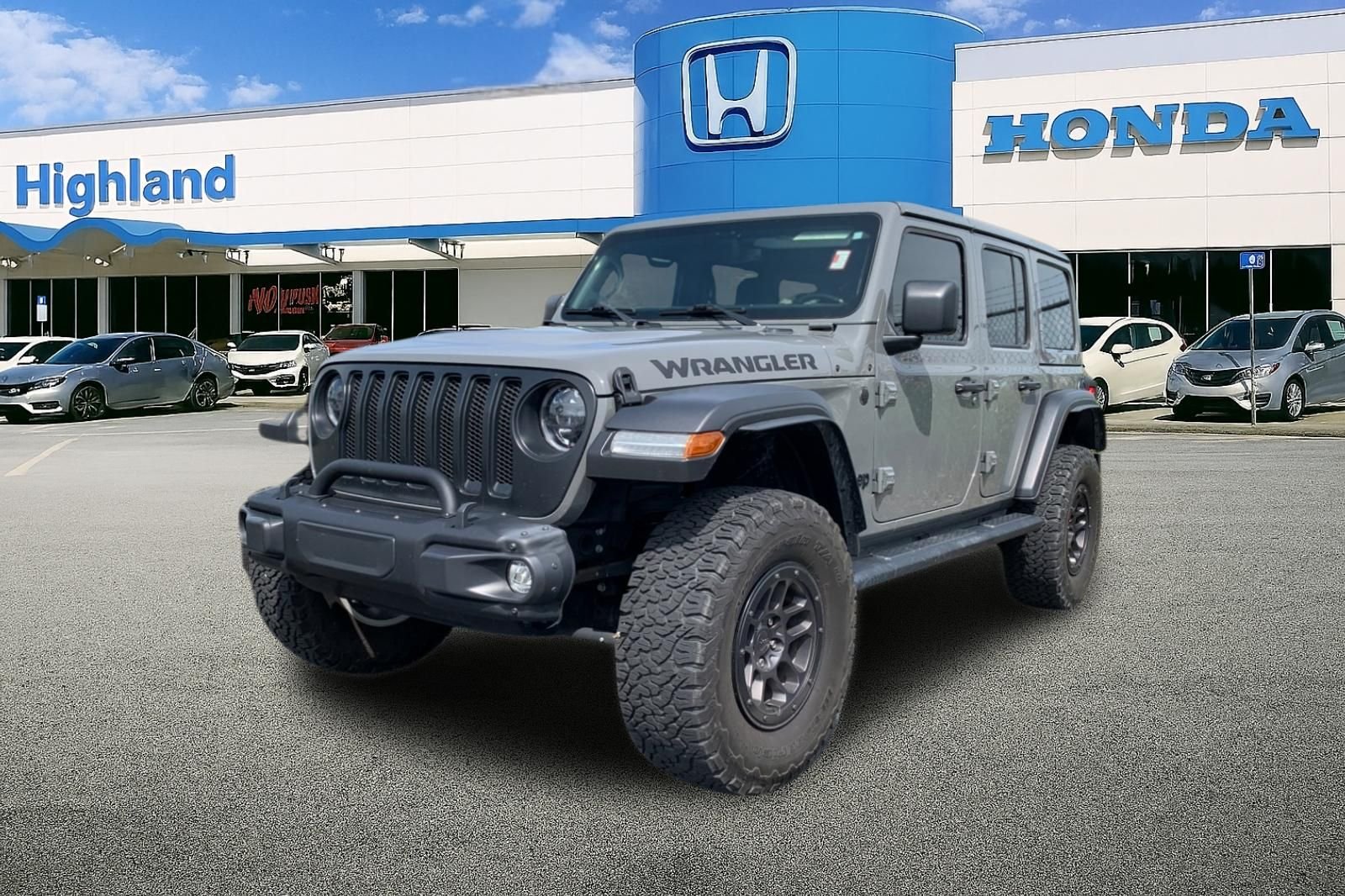 Used 2023 Gray Jeep High Tide image 1