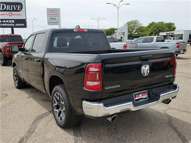 Used 2024 Diamond Black Crystal Pearlcoat RAM Laramie 4x4 Crew Cab 144.5 in. WB image 2