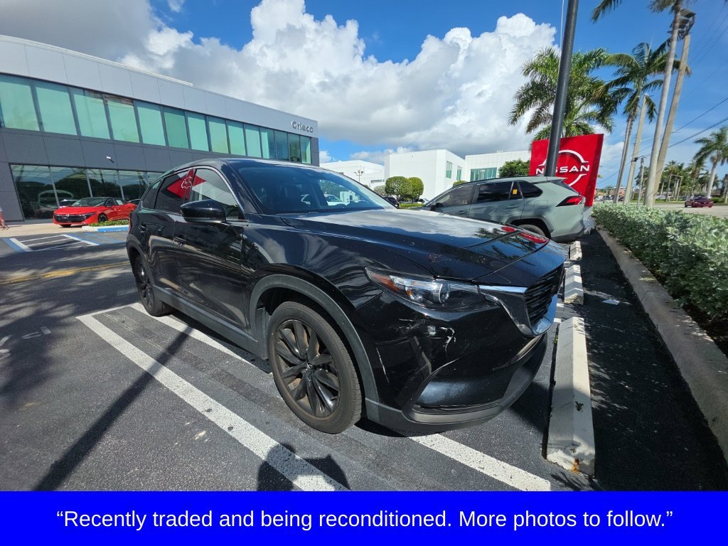 Used 2023 Black Mazda Touring Plus image 1