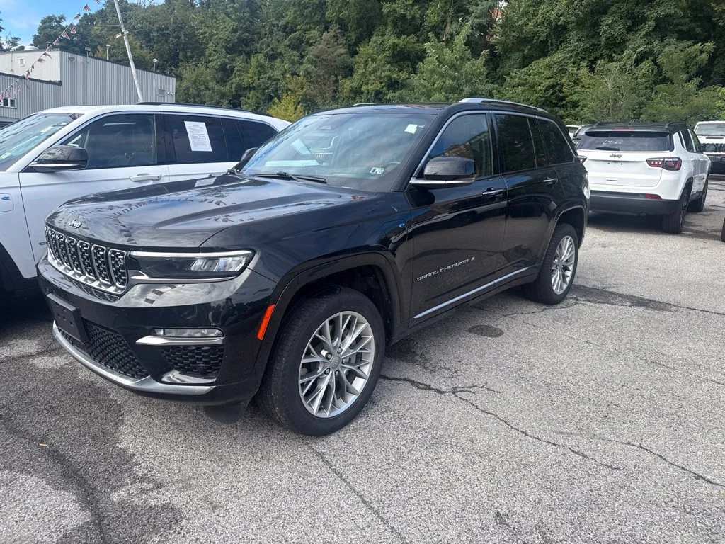 Used 2023 Black Jeep Summit 4xe image 1