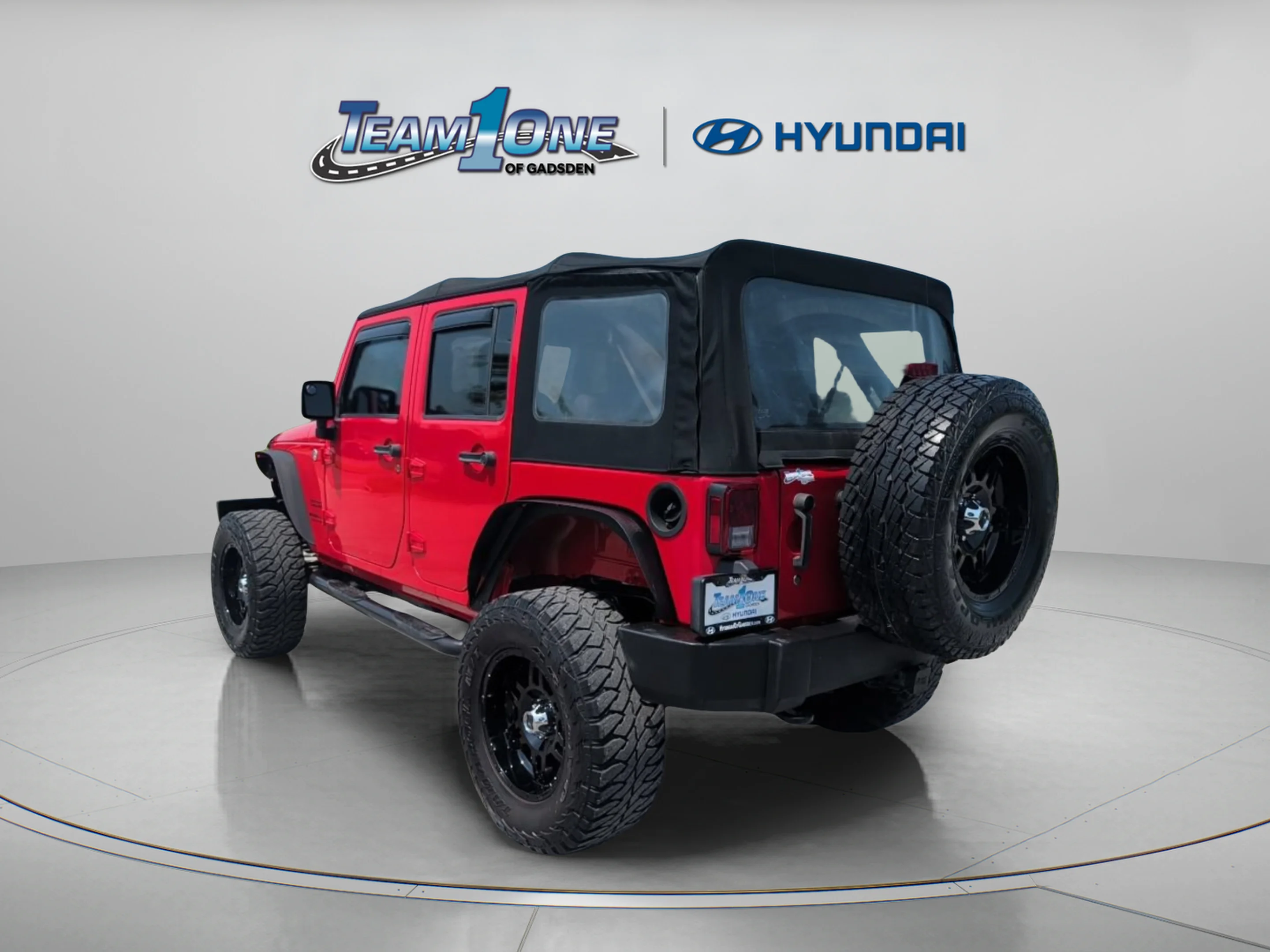 Used 2015 Firecracker Red Clear Coat Jeep Sport image 6