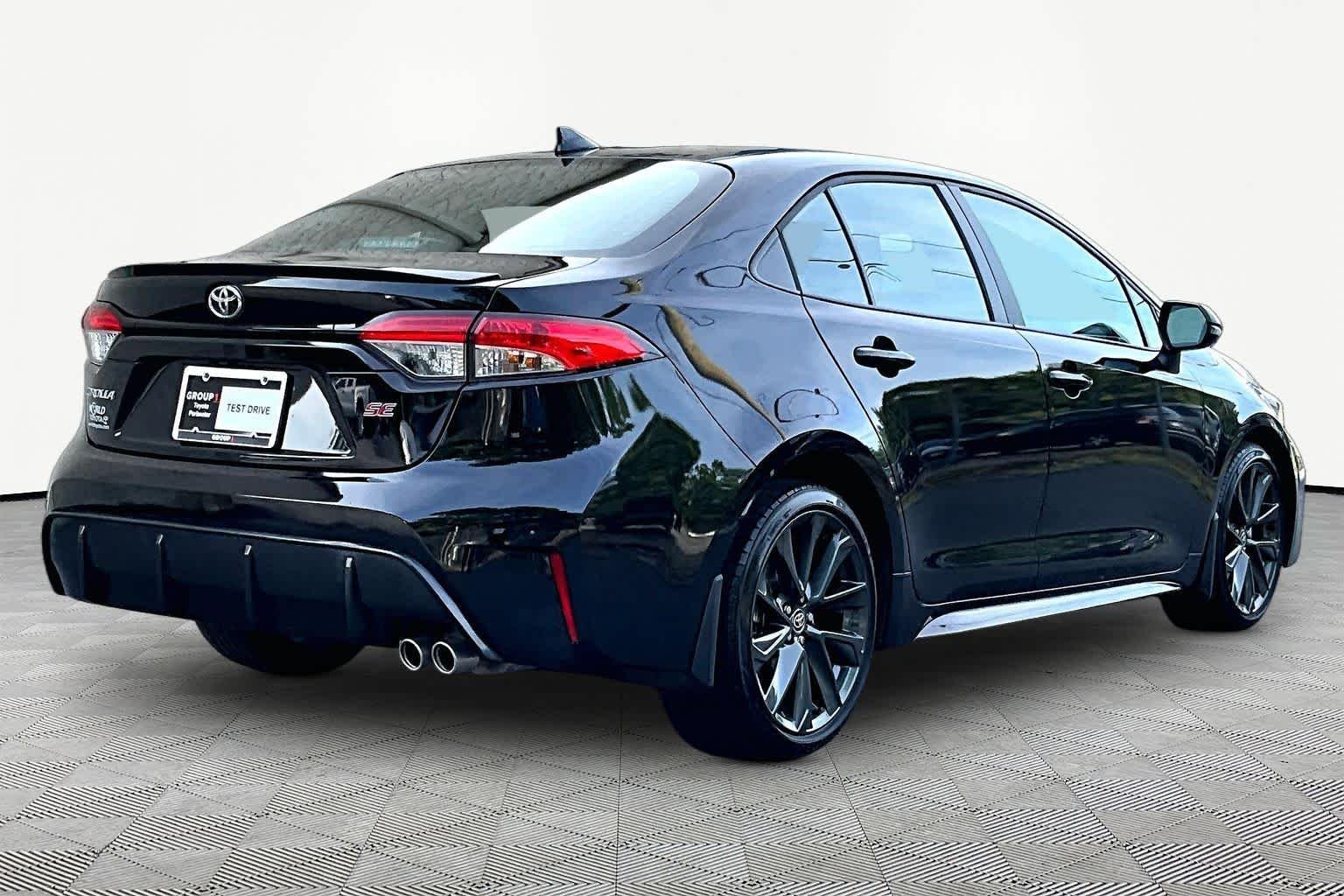Used 2025 Midnight Black Metallic Toyota SE image 13