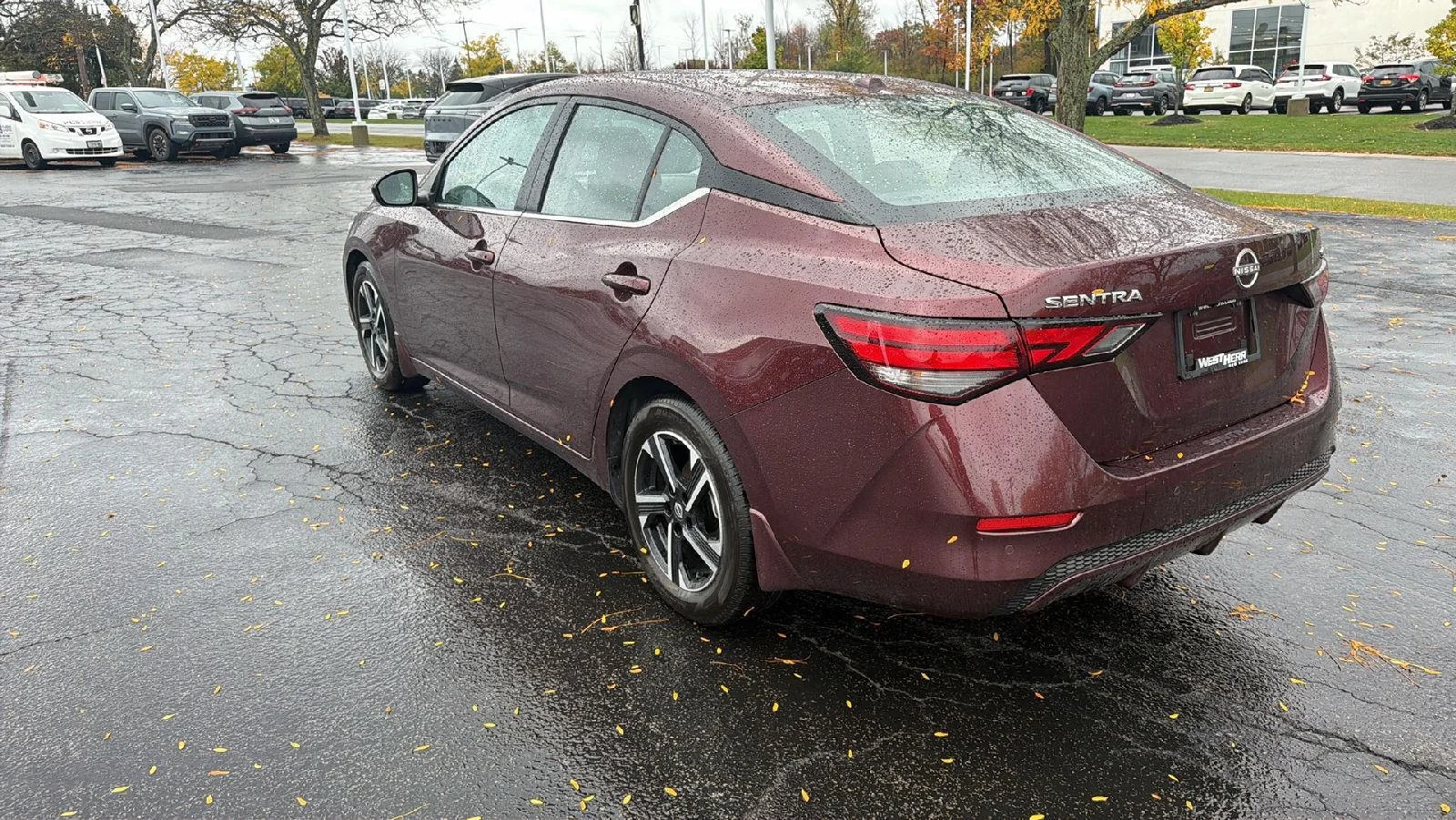 Used 2024 Rosewood Metallic Nissan SV image 3