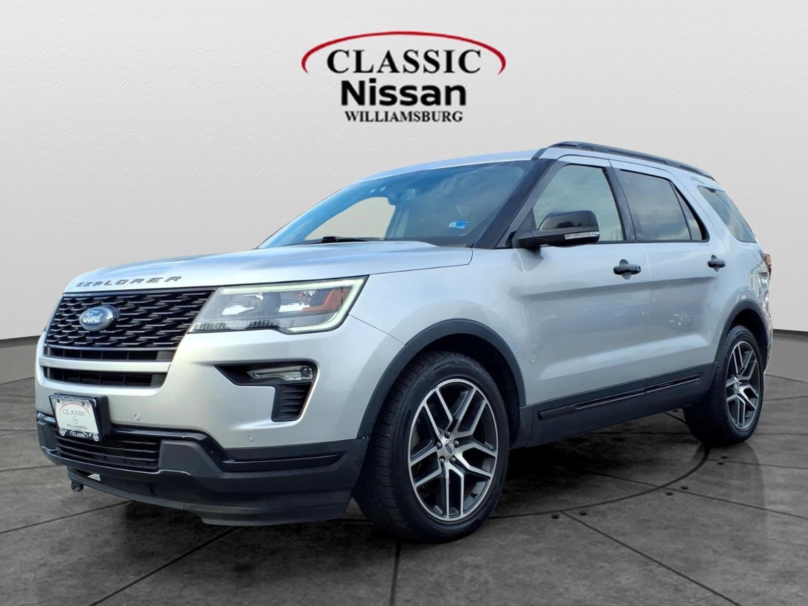 Used 2019 Ingot Silver Metallic Ford Sport image 1