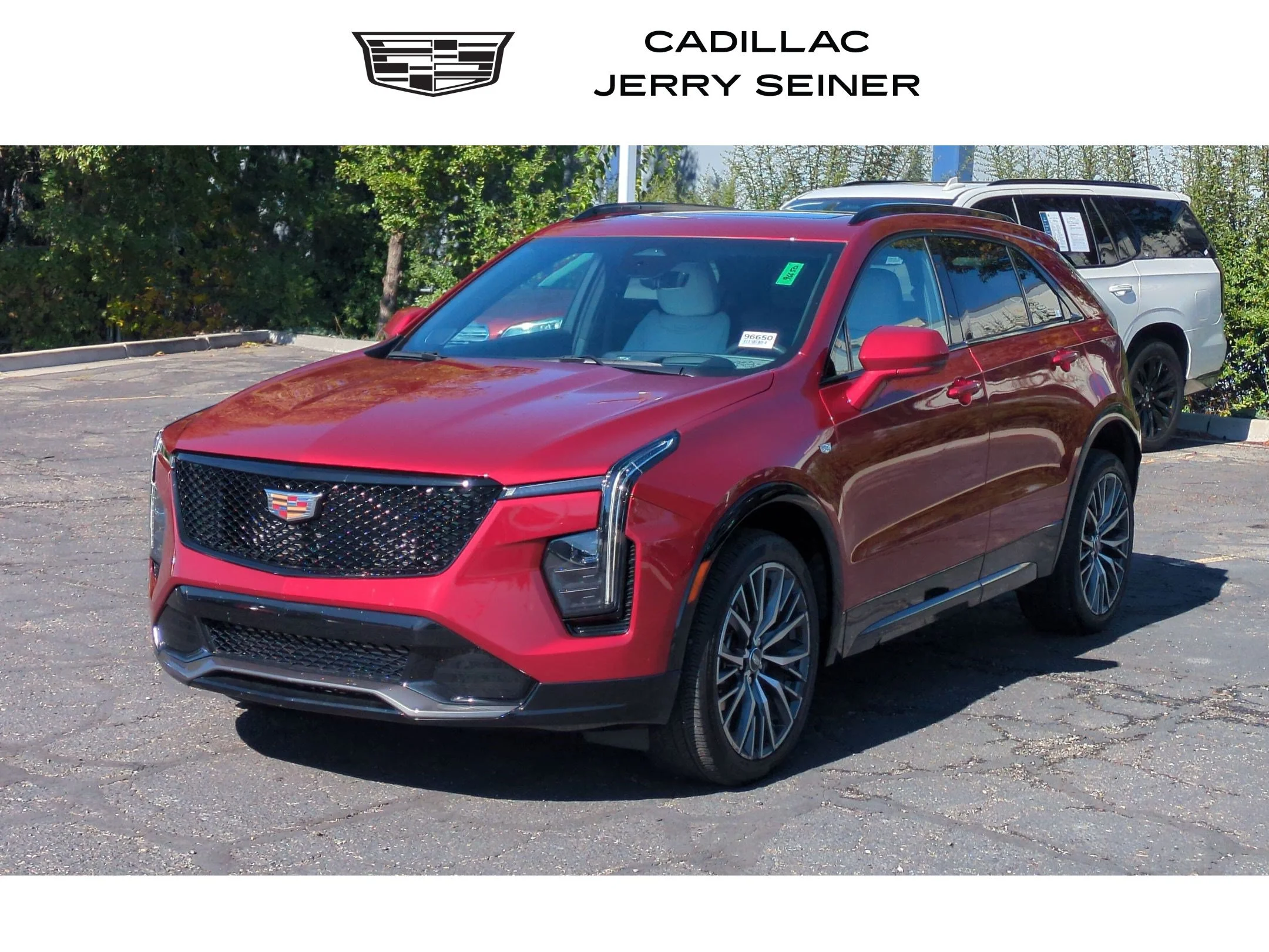 Used 2024 Radiant Red Tintcoat Cadillac AWD Sport image 1
