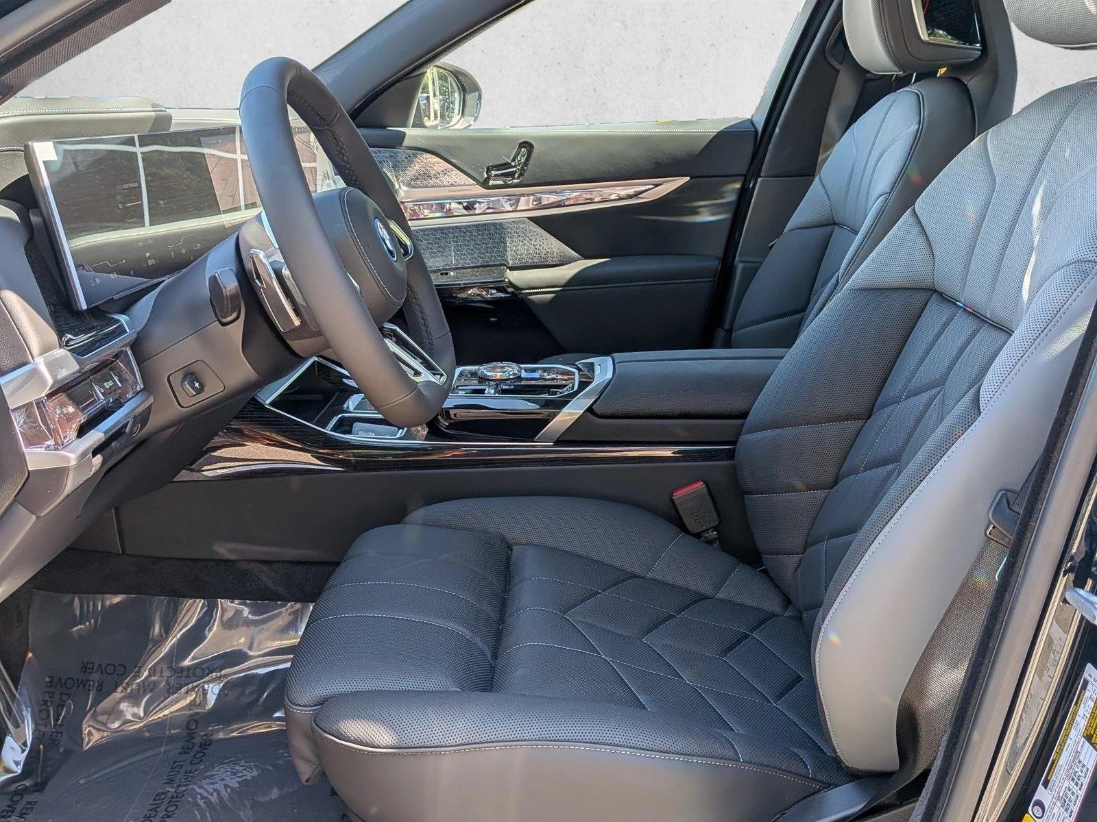 Used 2026 Carbon Black Metallic BMW xDrive60 image 4