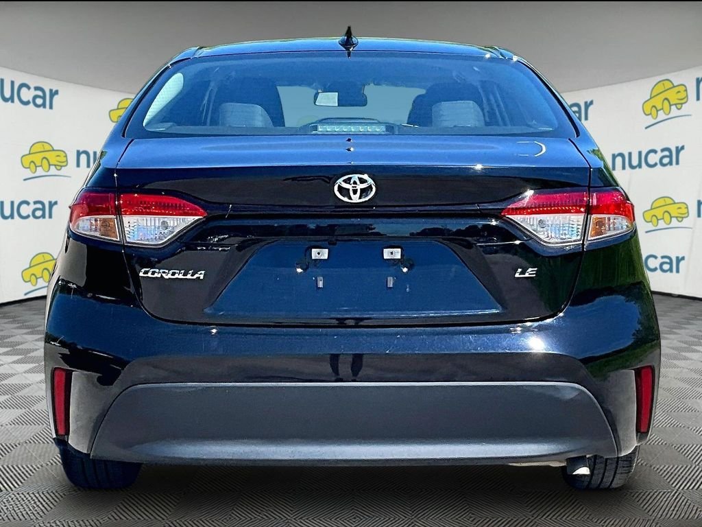 Used 2024 Black Toyota LE image 5