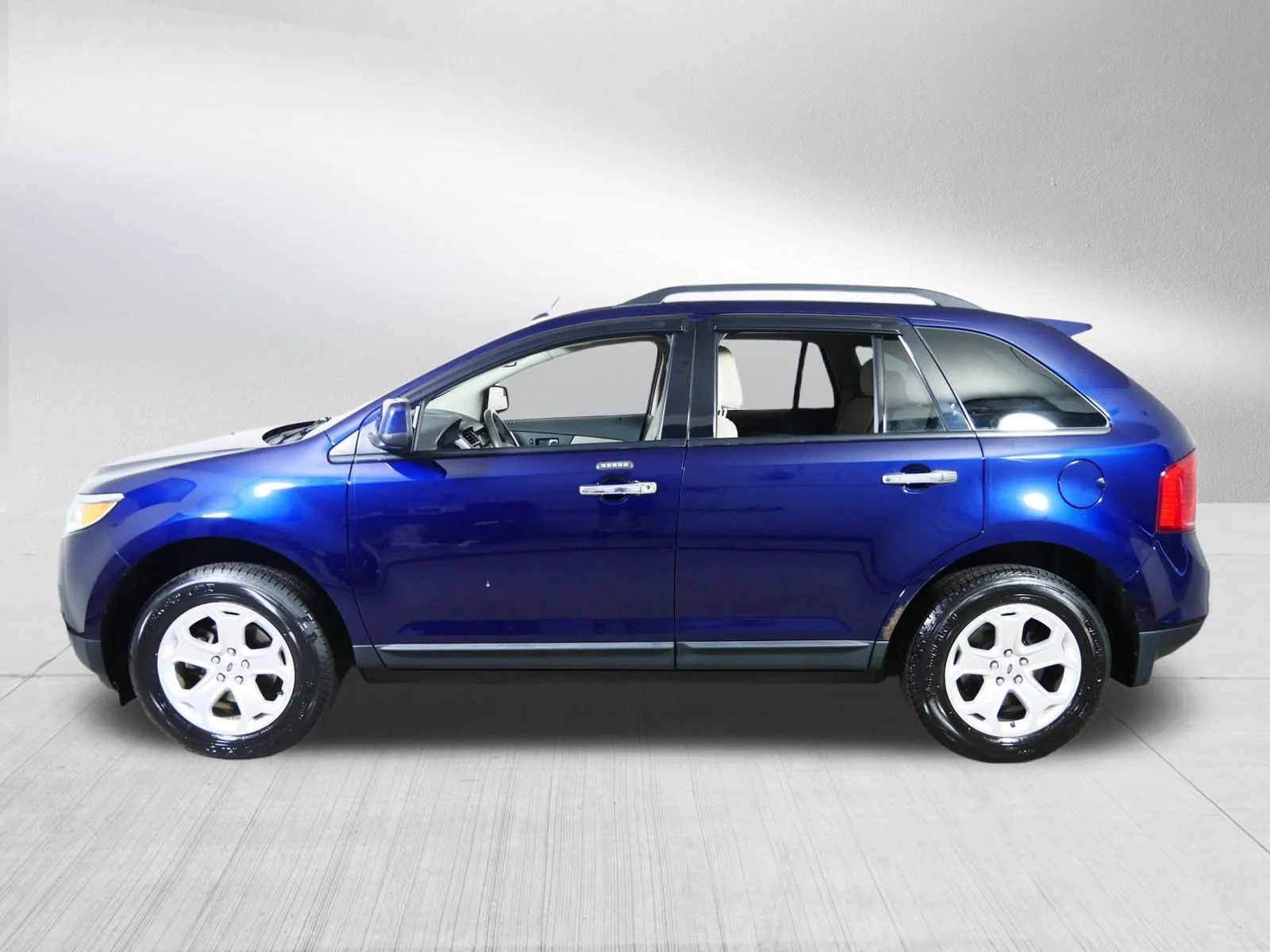 Used 2011 Kona Blue Metallic Ford SEL image 4