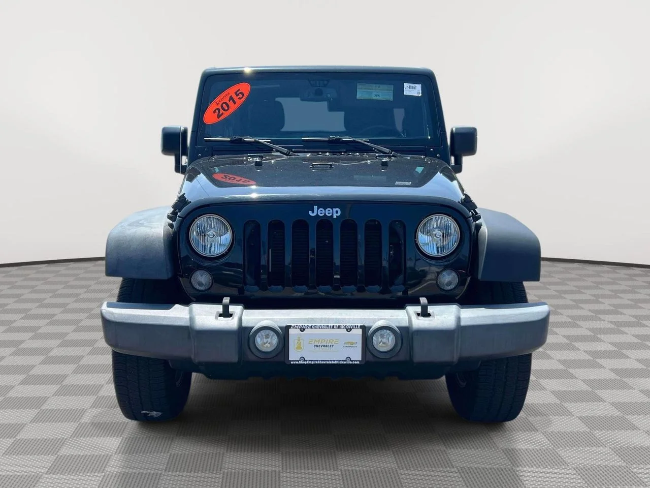 Used 2015 Black Clearcoat Jeep Sport image 2