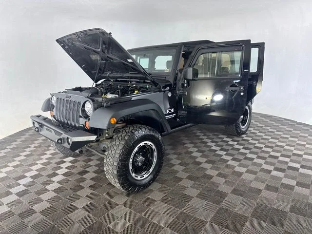 Used 2009 Black Jeep Unlimited X image 12