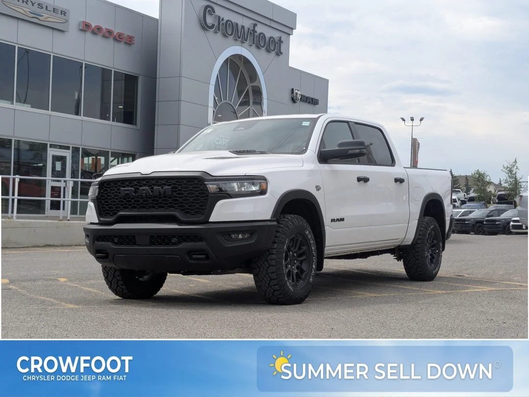 New 2026 White RAM Rebel - - 5.7L HEMI eTorque V8 - Steel Sport Hood - Trailer Brake Ctrl - Remote Start & More! image 1