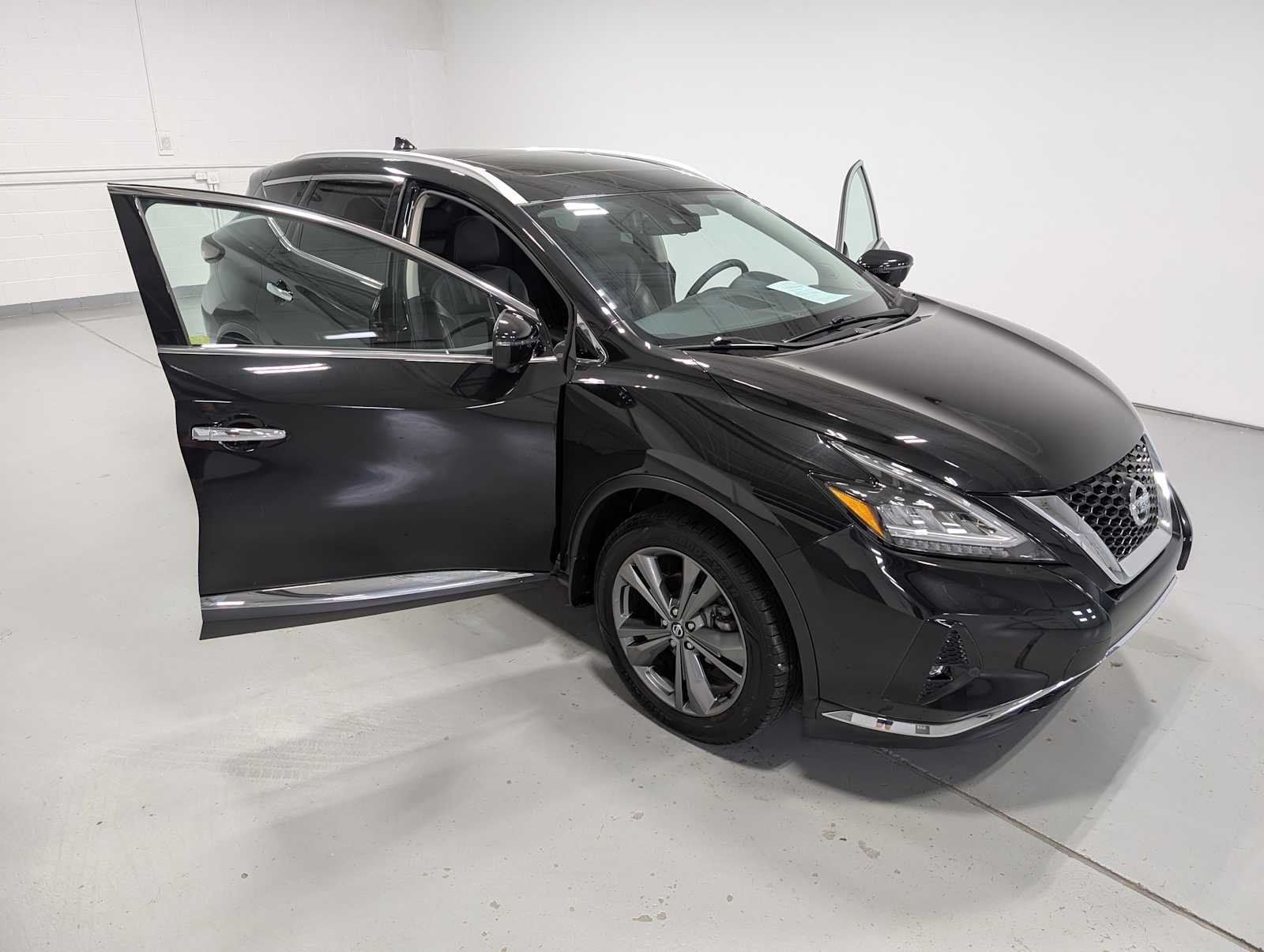Used 2019 Magnetic Black Pearl Nissan Platinum image 16