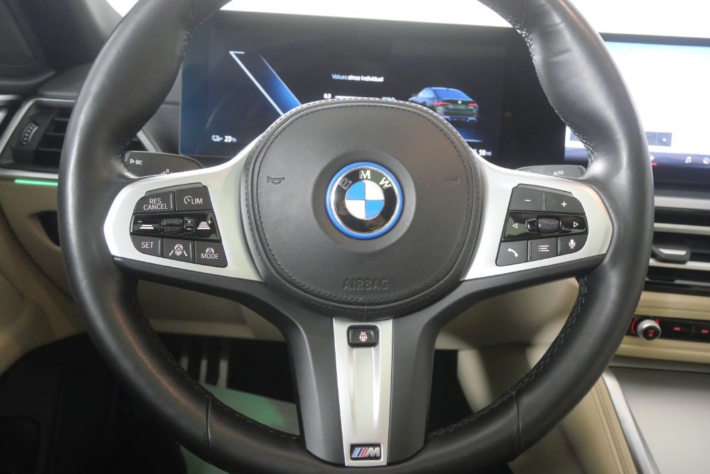 Certified Used 2024 Green Metallic BMW eDrive40 image 19