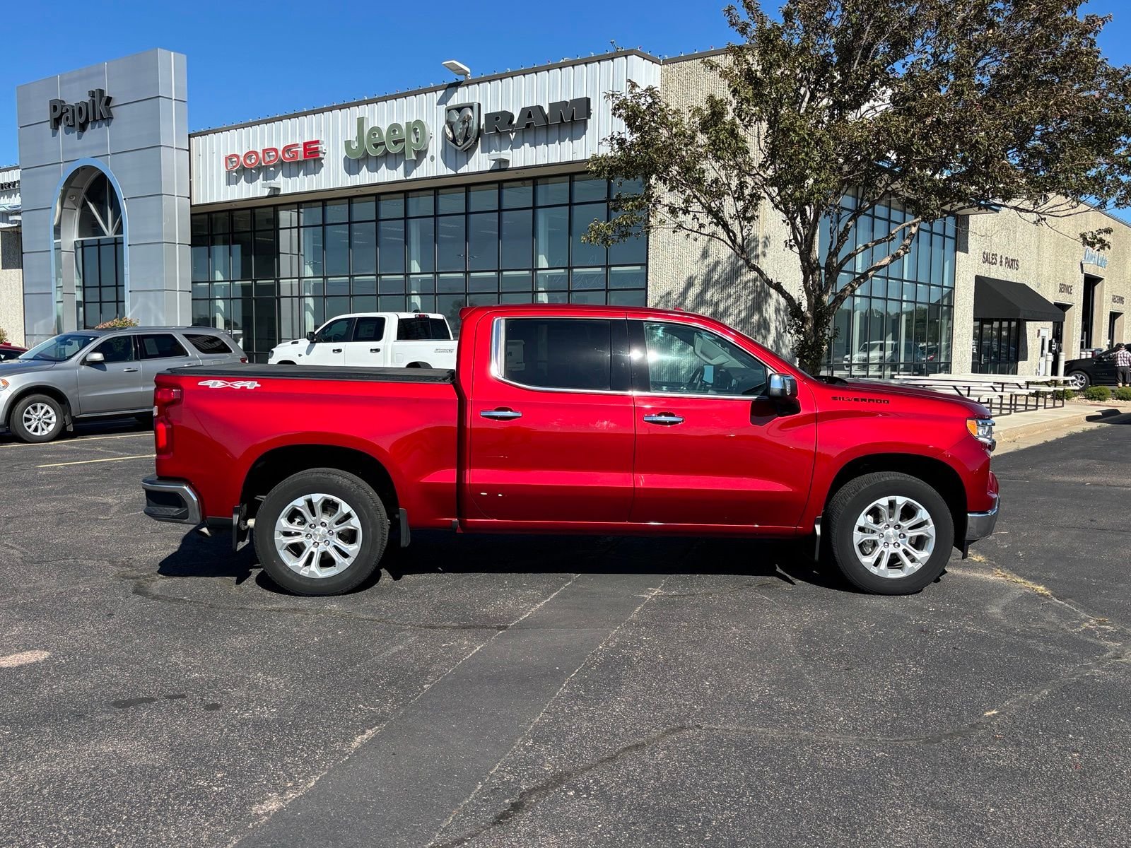 Used 2024 Radiant Red Chevrolet LTZ image 1
