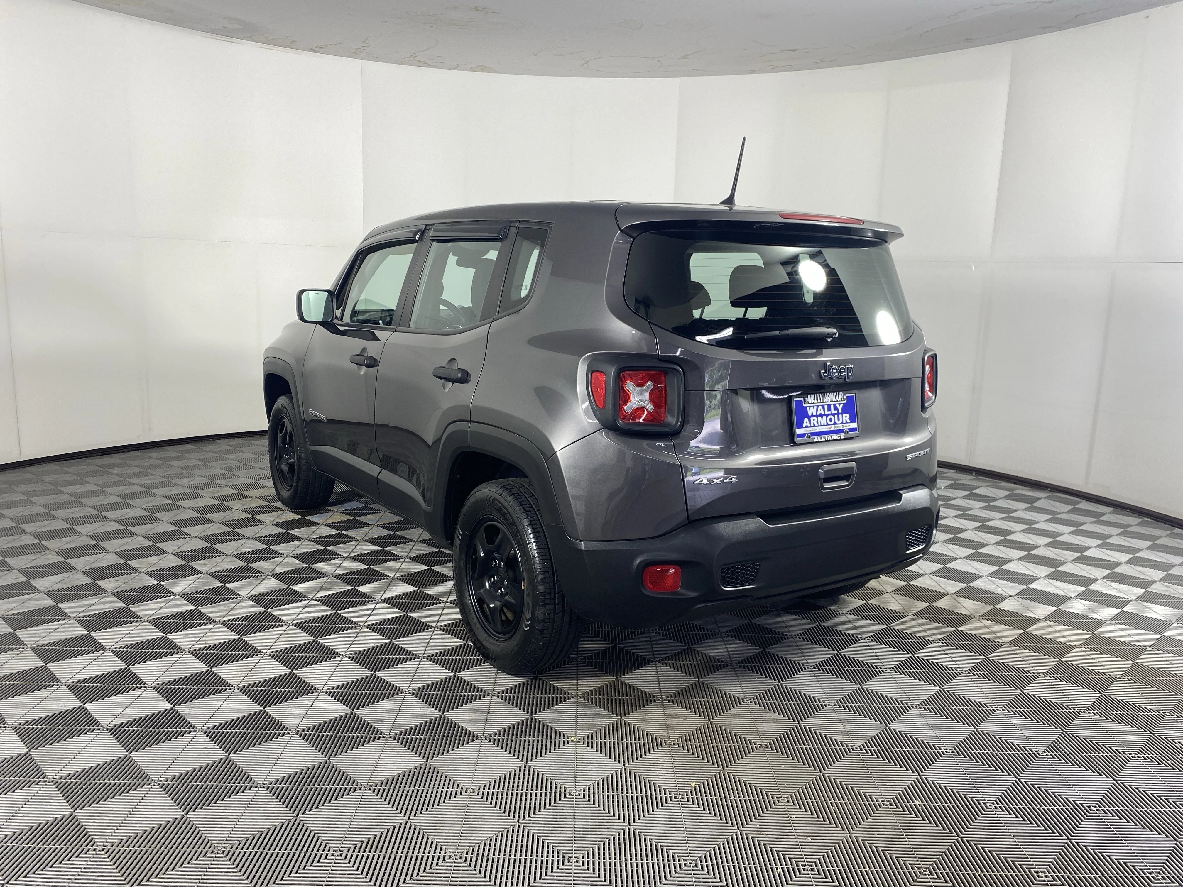 Used 2019 Granite Crystal Metallic Clearcoat Jeep Sport image 8